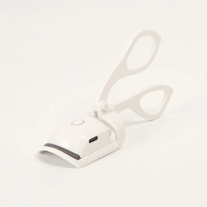 USB-Rechargeable Eyelash Curler - 2 temperature settings for customized curls that stay all day.